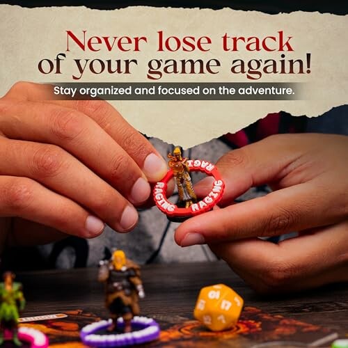 Hands organizing board game pieces with dice and miniatures.